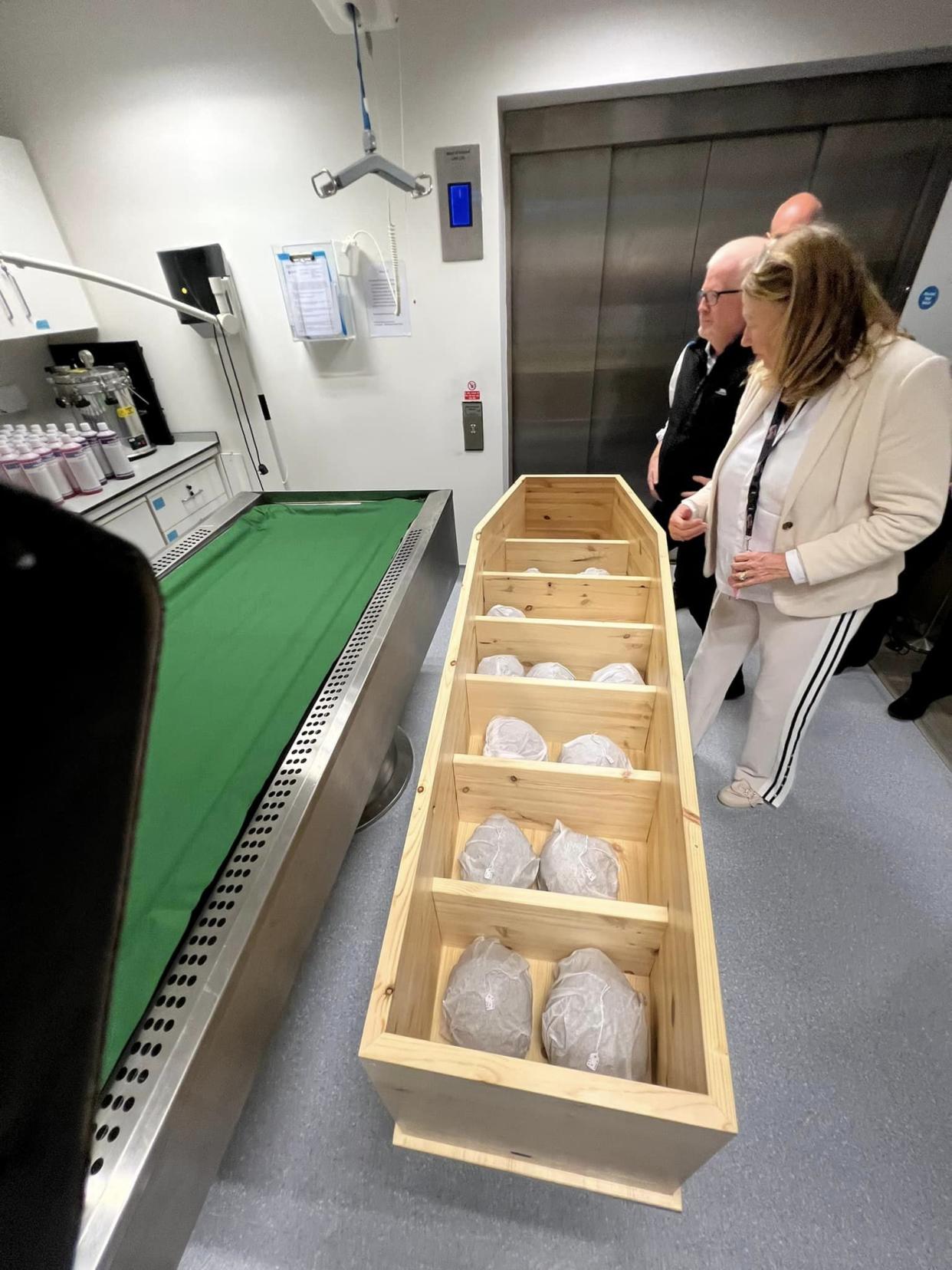 The skulls were placed in a traditional coffin designed by architect Christopher Day (Inishbofin Heritage Museum/PA)