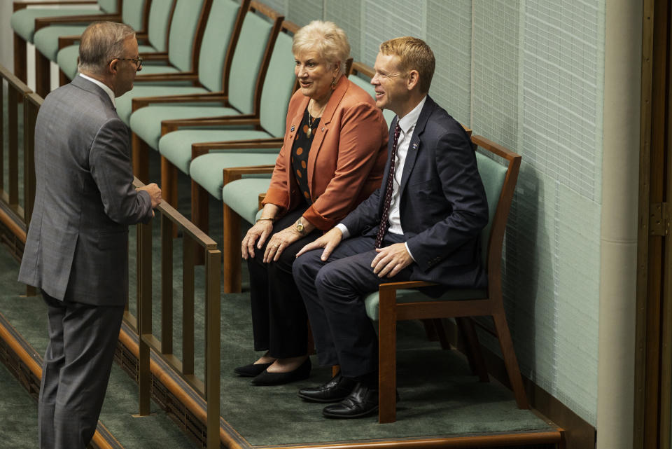 Australia's Prime Minister Anthony Albanese, left, speaks with New Zealand's ambassador to Australia, Dame Annette King and New Zealand's Prime Minister Chris Hipkins, right, before Question Time in the House of Representatives at Parliament House in Canberra, Australia, Tuesday, Feb. 7, 2023. (AP Photo/Hilary Wardhaugh)