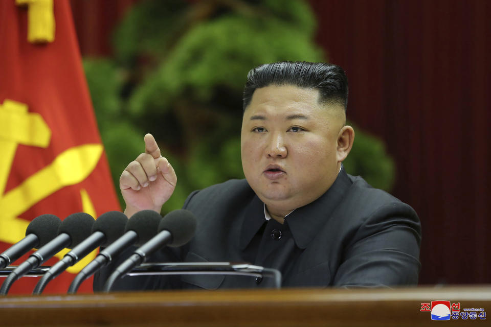 In this Saturday, Dec. 28, 2019, photo provided by the North Korean government, North Korean leader Kim Jong Un speaks during a Workers’ Party meeting in Pyongyang, North Korea. North Korea opened a high-profile political conference to discuss how to overcome “harsh trials and difficulties," state media reported Sunday, Dec. 29, 2019, days before a year-end deadline set by Pyongyang for Washington to make concessions in nuclear negotiations. Independent journalists were not given access to cover the event depicted in this image distributed by the North Korean government. The content of this image is as provided and cannot be independently verified. Korean language watermark on image as provided by source reads: "KCNA" which is the abbreviation for Korean Central News Agency. (Korean Central News Agency/Korea News Service via AP)