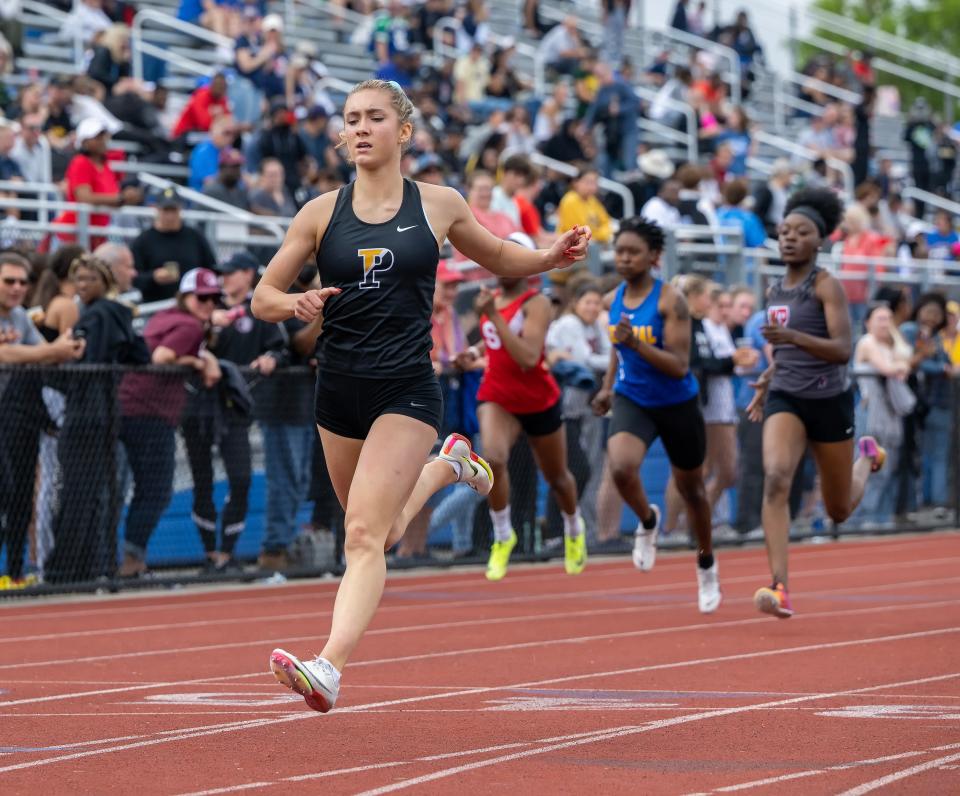 Padua’s Juliana Balon wins the Division I girls 200-meter dash at the DIAA Track & Field Championships at Dover High on Saturday, May 20, 2023.