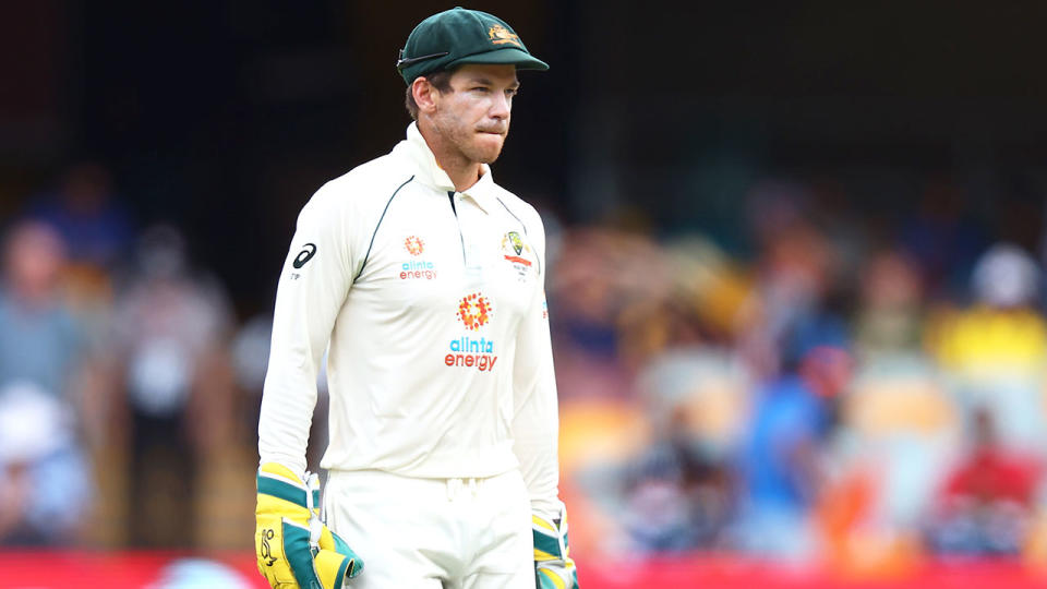 Tim Paine is pictured looking dejected in this photo from a Test match.