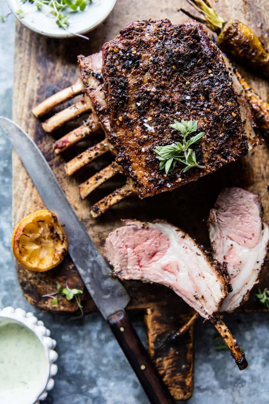 <strong>Get the <a href="https://www.halfbakedharvest.com/roasted-rack-lamb-basil-goat-cheese-sauce/" target="_blank">Roasted Rack of Lamb with Basil Goat Cheese Sauce recipe</a> from&nbsp;Half Baked Harvest</strong>