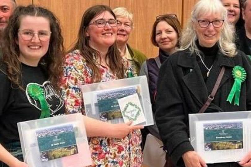 Cheltenham Borough Council's Green Partty councillors Ashleigh Davies, Tabi Joy and Jan Foster