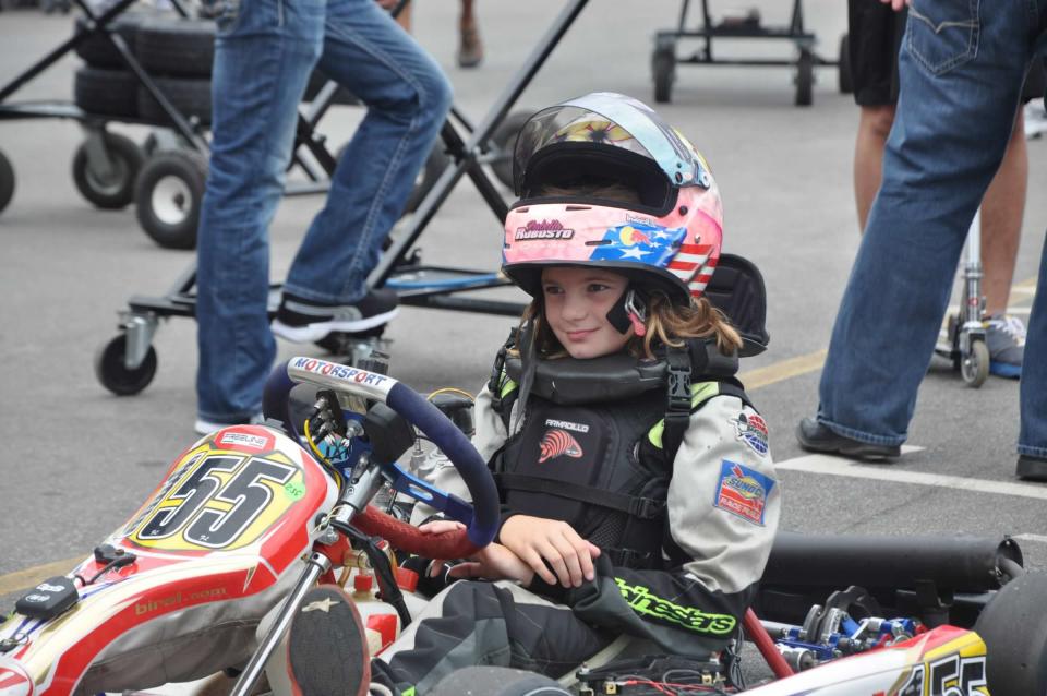 Young Isabella Robusto gearing up for a race.