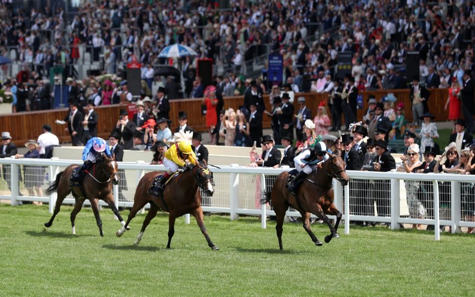 Quick Suzy and Gary Carroll (right) coming home to win the Queen Mary Stakes - PA Wire