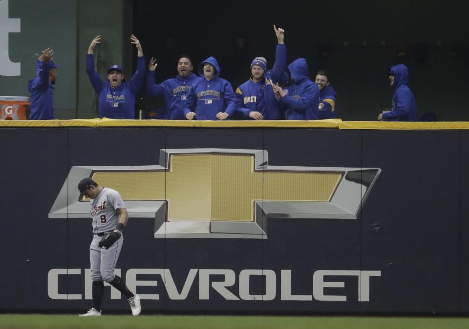 The Milwaukee Brewers bullpen reacts after Christian Yelich hits a two-run home run during the third inning of a baseball game against the Detroit Tigers Saturday, Sept. 29, 2018, in Milwaukee. (AP Photo/Morry Gash)