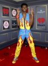 <p>It's prob too on the nose the say this look was fire, but it's the truth! Something about this artist's commitment to matching sets always works. Example number 856? This outfit at the iHeart Radio Music Festival, from the vest to the kicks.</p>