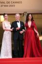 <p>Michael Douglas was flanked by the two leading ladies in his life at the Cannes 2023 screening of 'Jeanne du Barry'. Wife Catherine Zeta-Jones in a plunge-necked A-line caped dress by Elie Saab and daughter Carys in a sheer appliqué Elie Saab spring 2023 gown.</p>