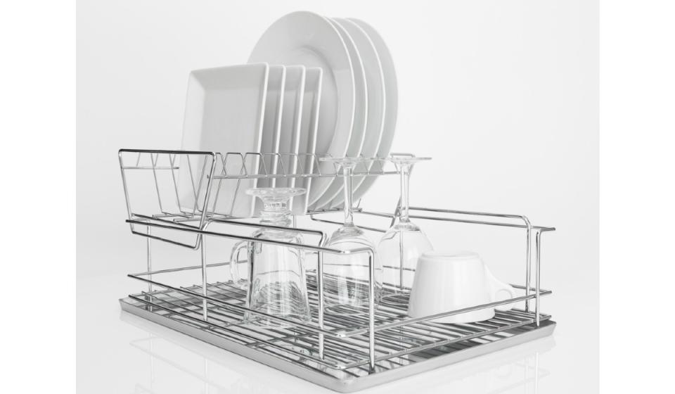 Stainless dishwashing rack with plates and cups