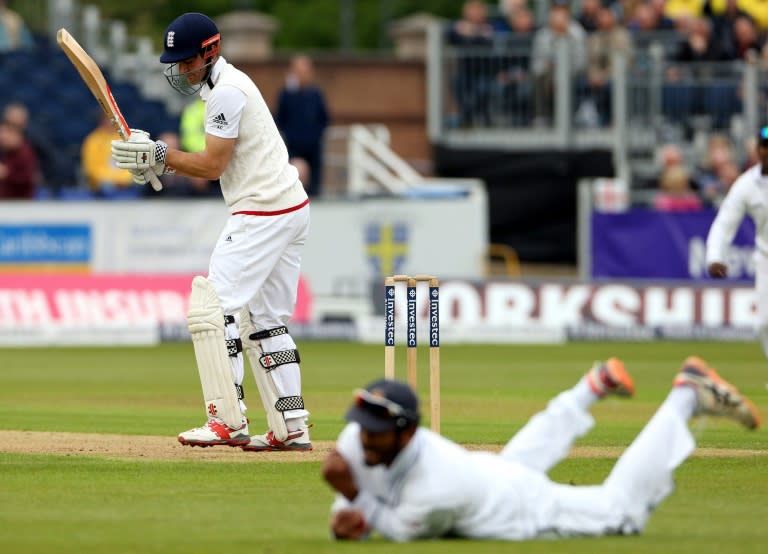 England captain Alastair Cook is caught by Sri Lanka's Dimuth Karunaratne for 15 on the first day of the second Test in Chester-le-Street, northeast England, on May 27, 2016