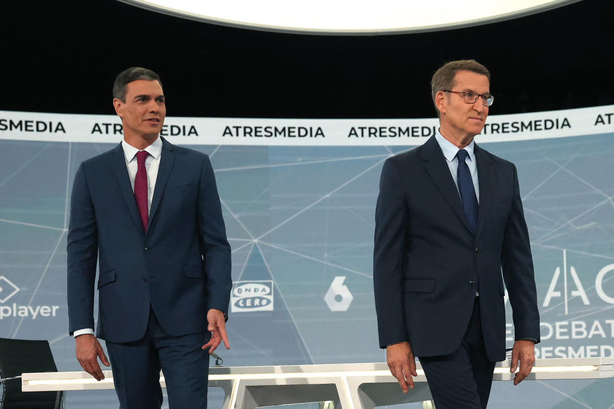 Candidates for Spain's Prime Minister, Socialist Party (PSOE) incumbent Prime Minister Pedro Sanchez and right-wing opposition party Partido Popular (PP) leader Alberto Nunez Feijoo (R) arrive prior taking part in an electoral TV debate organized by Atresmedia at San Sebastian de los Reyes, near Madrid on July 10, 2023 ahead of July 23 general election. Spain's Prime Minister re-election hopes depend on the support of the radical left which have agreed to join forces to contest July 23 snap election, while most surveys suggest the PP will win but will need to form alliance with far right party to be able to form a government. (Photo by Pierre-Philippe MARCOU / AFP)
