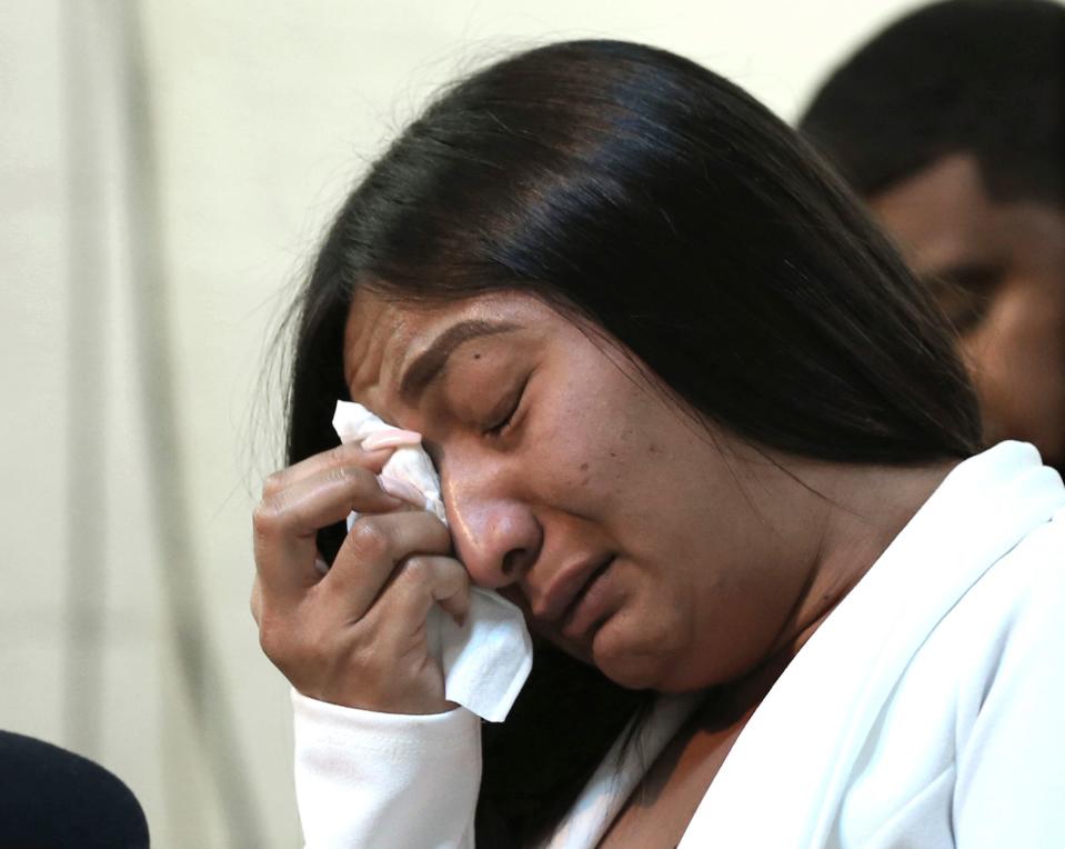 Salena Manni, the fiancee of Stephon Clark, wipes tears from her eyes during a news conference. On Saturday Sacramento prosecutors announced that no charges would be filed against cops for the shooting death of Clark, a 22-year-old black man who was killed by police in his grandmother's back yard.