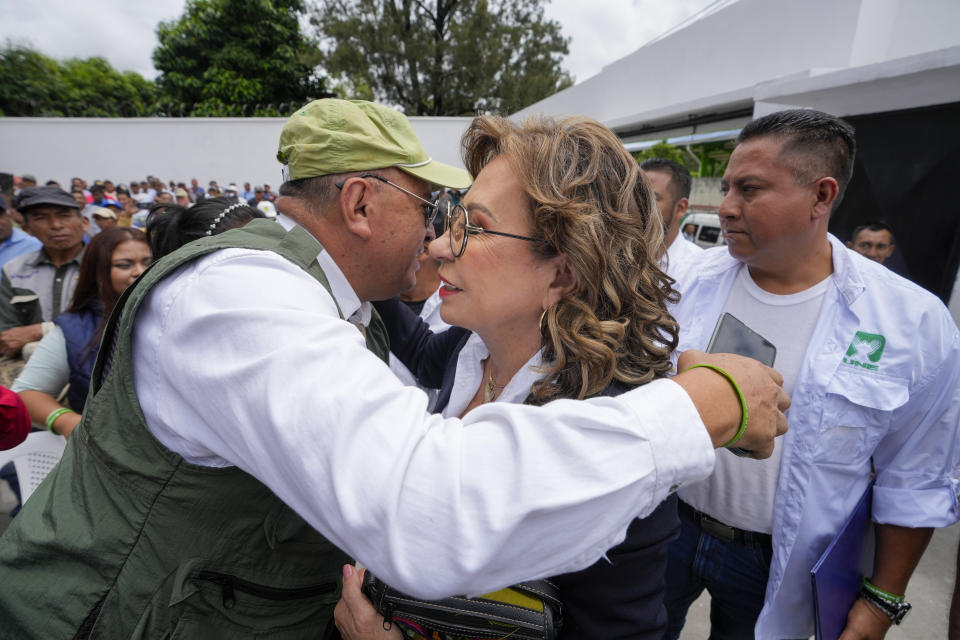 A Guatemalan Army veteran embraces UNE party presidential candidate Sandra Torres as she arrives at a meeting in Guatemala City, Tuesday, Aug. 15, 2023. Torres will face Bernardo Arévalo of the Seed Movement party in an Aug. 20 runoff election. (AP Photo/Moises Castillo)