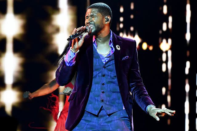 <p>Denise Truscello/Getty</p> Usher performs in Las Vegas in July 2022