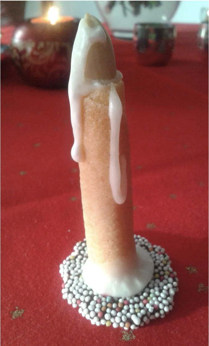 phallic-looking candle cookie