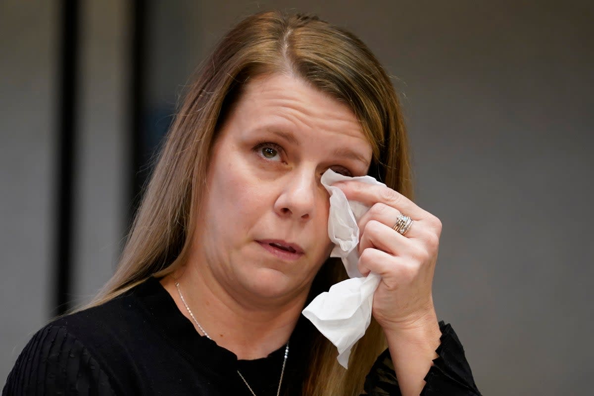 Gabby Petito’s mother Nichole Schmidt, wipes a tear from her face during a news conference  in 2022 (Copyright 2022 The Associated Press. All rights reserved)