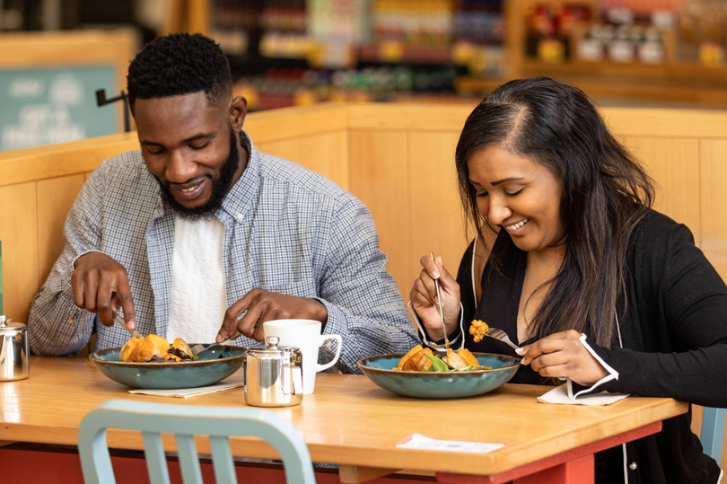 Customers at a Morrisons Café as they team up with Heinz Beanz to launch the 'Ask for Henry'