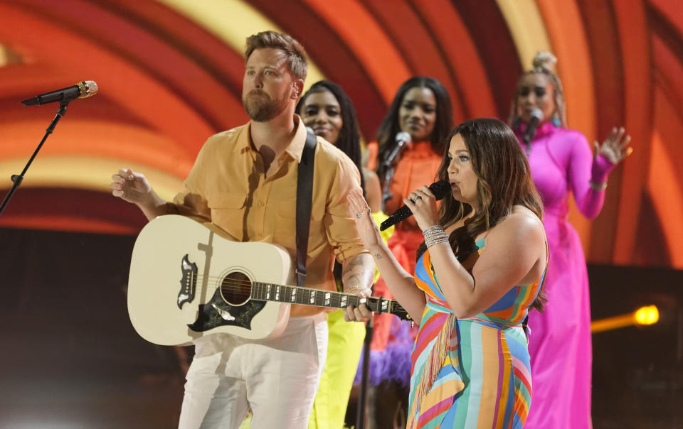 Charles Kelley, left, and Hillary Scott of Lady A perform "Like A Lady" at the CMT Music Awards at the Bridgestone Arena on Wednesday, June 9, 2021, in Nashville, Tenn. (AP Photo/Mark Humphrey)