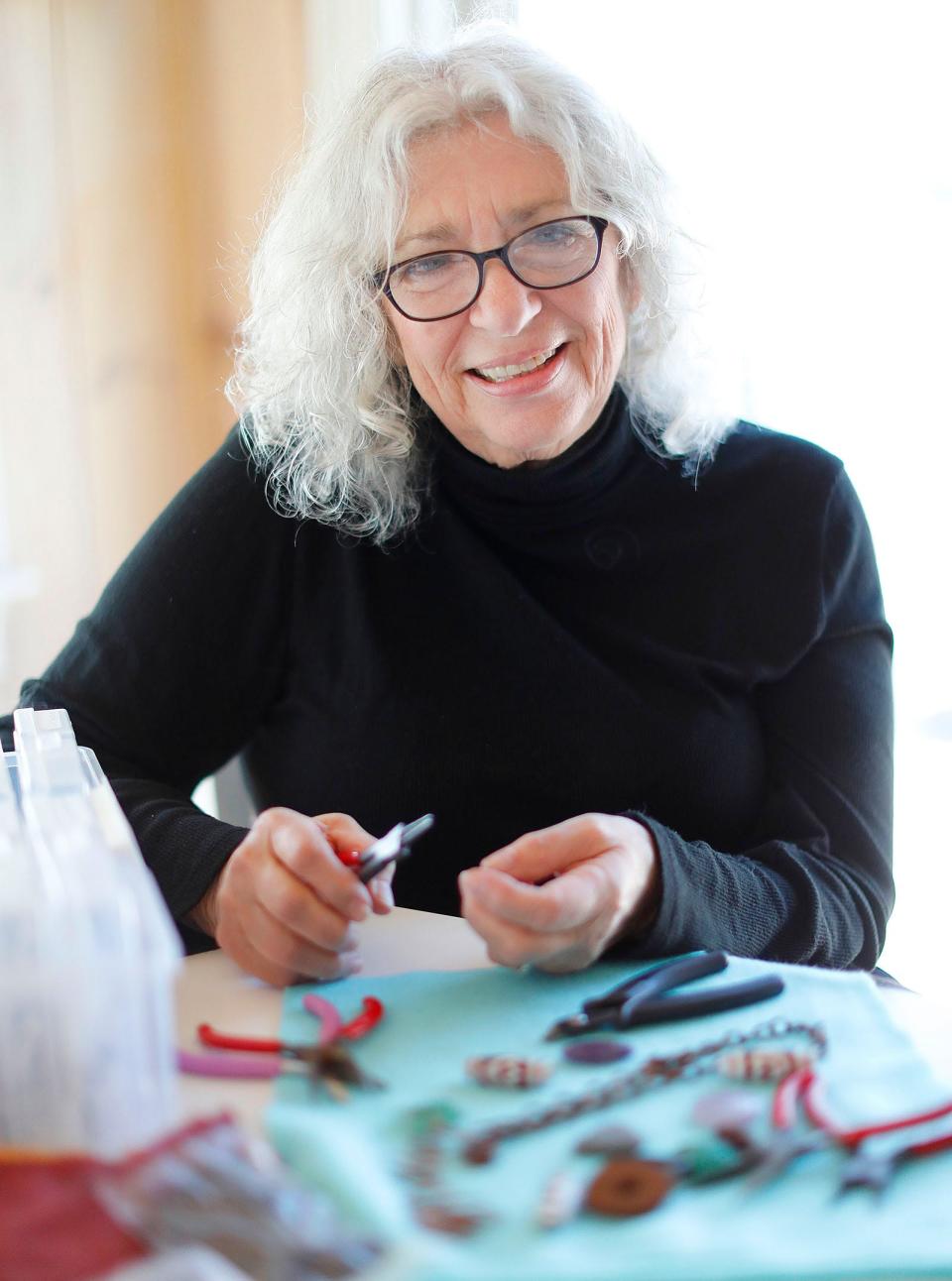 Linda Santoro likes to make jewelry. Her work is on display at the Quincy Art Association.