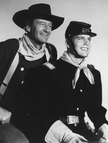 <p>Warner Bros/Kobal/Shutterstock</p> John Wayne and Patrick Wayne in 'The Searchers'.