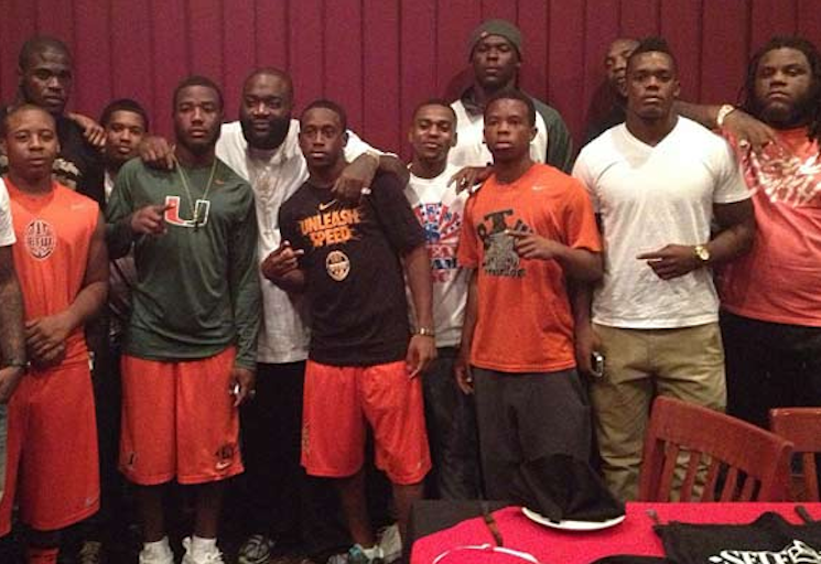 Platinum-selling rapper Rick Ross hangs out with the Washington High football team — Instagram