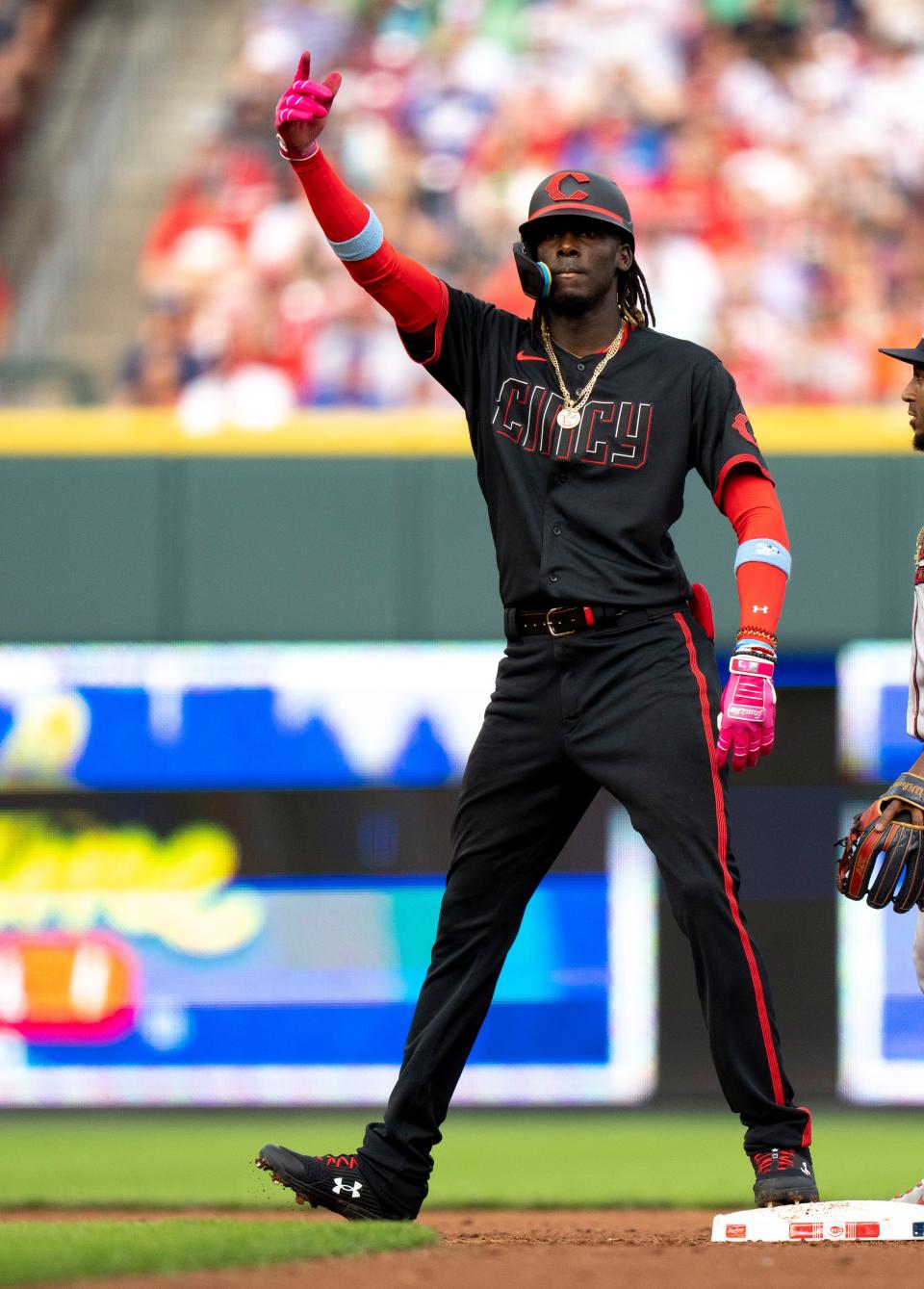 Cincinnati Reds third baseman Elly De La Cruz (44) reaches second on a double in the second inning of Friday's MLB baseball game between the Reds and the Atlanta Braves at Great American Ball Park in Cincinnati on June 23, 2023.