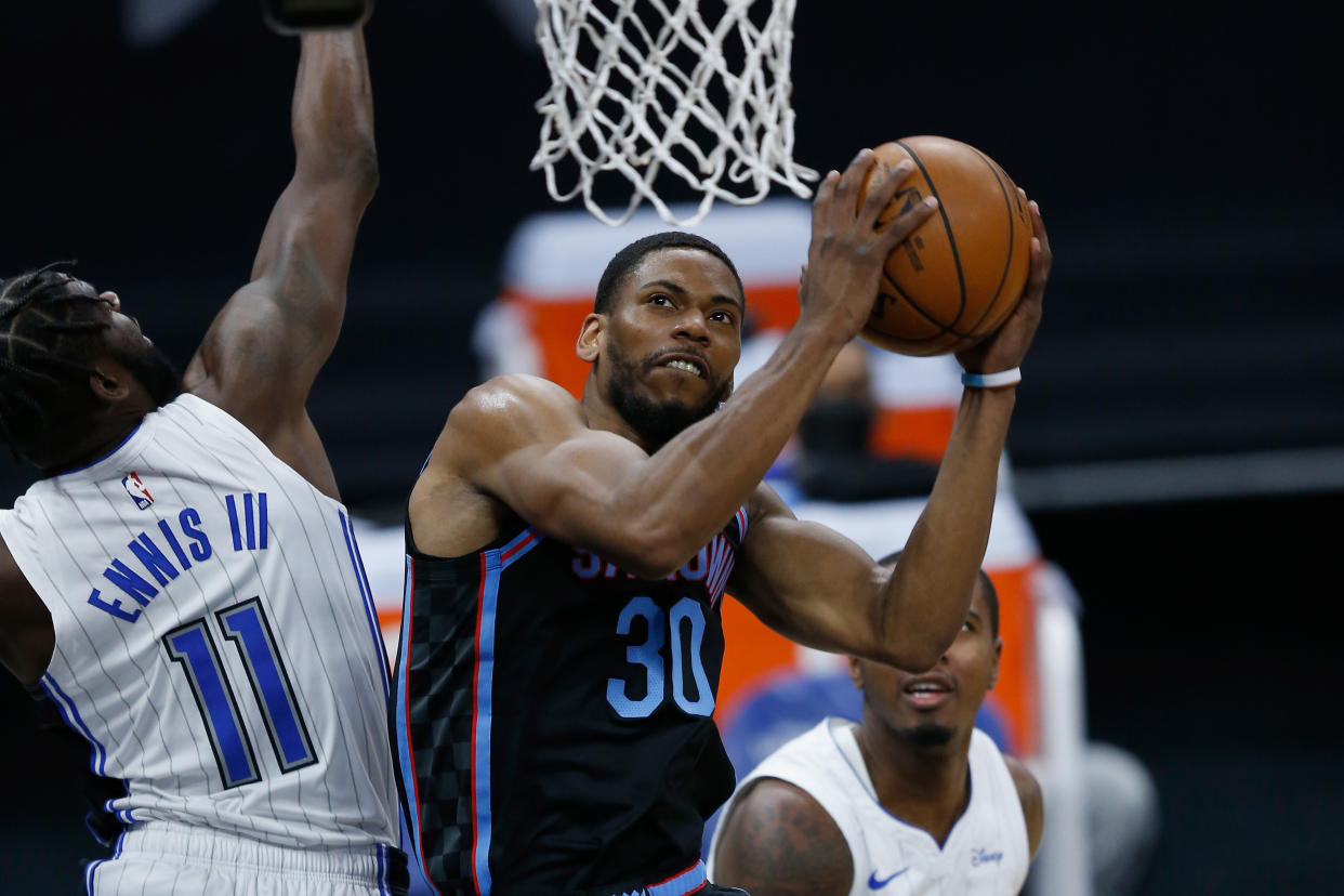 SACRAMENTO, CALIFORNIA - FEBRUARY 12: Glenn Robinson III #30 of the Sacramento Kings goes to the basket in the first half against the Orlando Magic at Golden 1 Center on February 12, 2021 in Sacramento, California. NOTE TO USER: User expressly acknowledges and agrees that, by downloading and/or using this photograph, user is consenting to the terms and conditions of the Getty Images License Agreement. (Photo by Lachlan Cunningham/Getty Images)