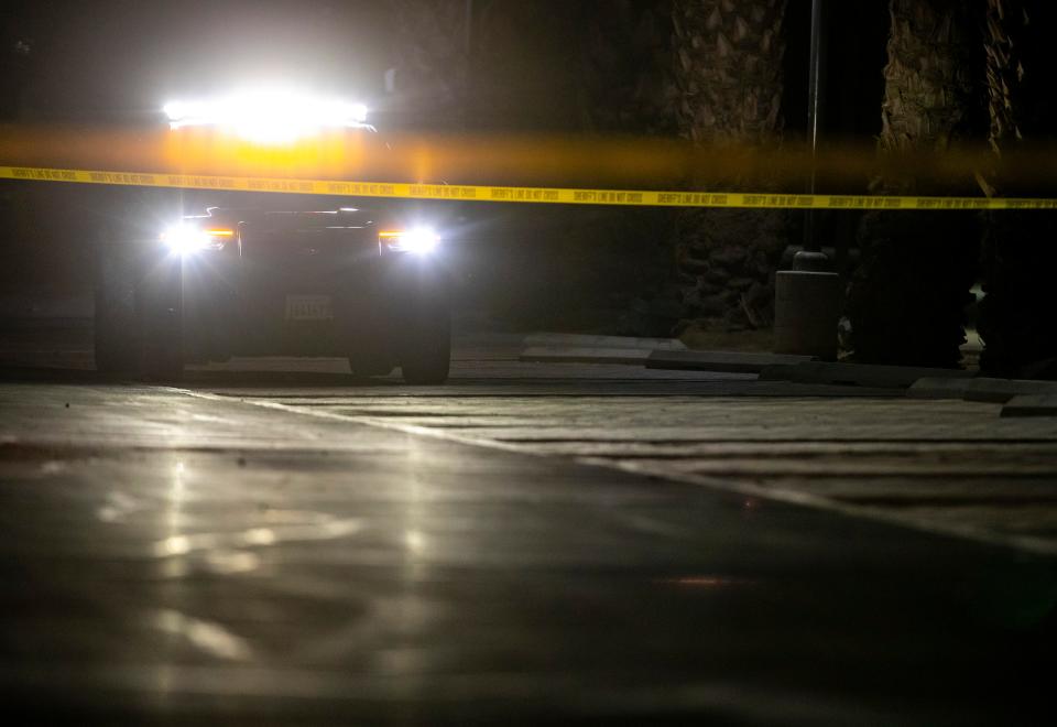 A Riverside County squad car is seen parked at an apparent crime scene at the Aquatic Center in Palm Desert, Calif., Friday, Sept. 13, 2024.