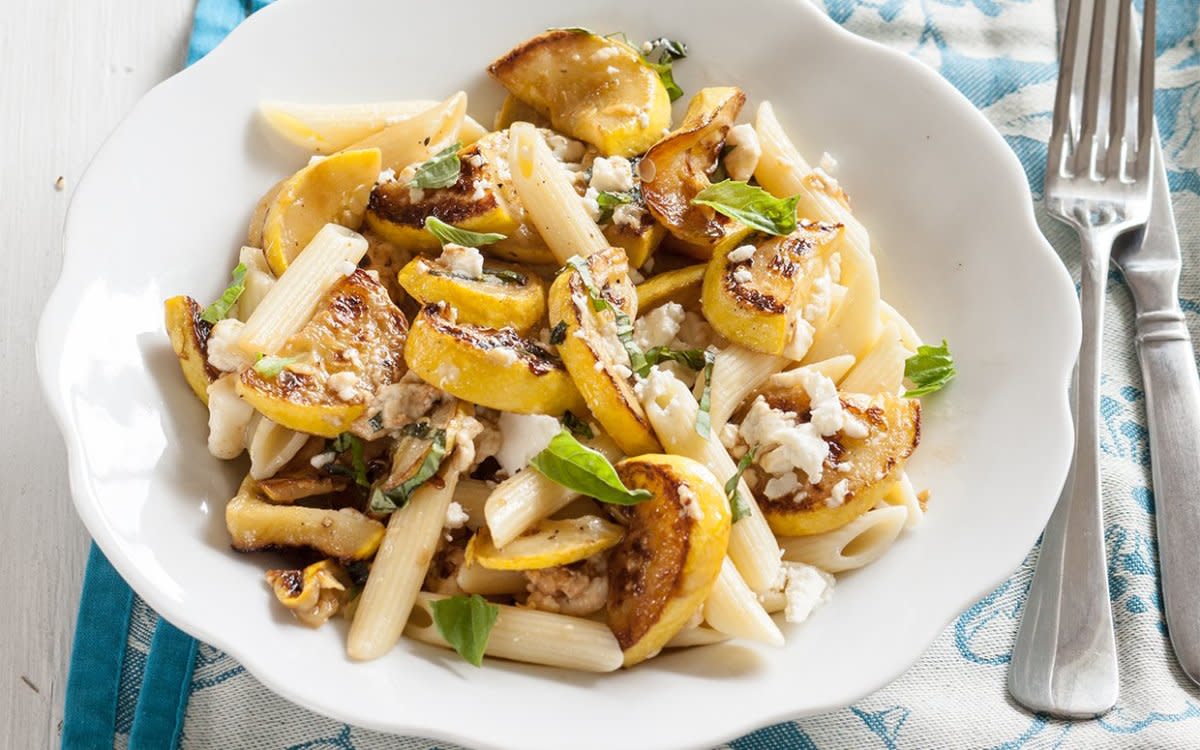 <p>Mark Boughton Photography</p><p>Filled with crumbly feta cheese and tender yellow squash, this light and bright pasta is a summertime hit. </p><p><strong>Get the recipe: <a href="/842369/communitytable/summer-squash-feta-pasta/" data-ylk="slk:Summer Squash Feta Pasta;elm:context_link;itc:0;sec:content-canvas" class="link rapid-noclick-resp">Summer Squash Feta Pasta</a></strong></p>