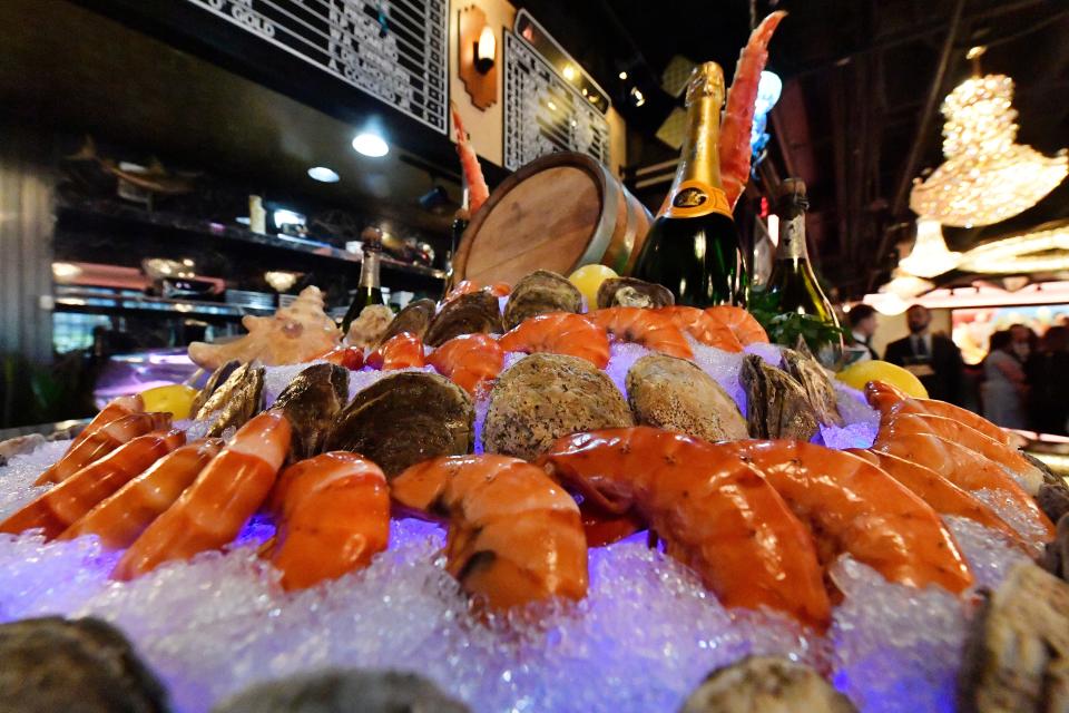 Oysters and shrimp sit in ice at the at the Raw Bar at Jeff Ruby's Steakhouse, Friday, Aug. 25, 2023 in Louisville Ky. The steakhouse, has been upgraded with new booths around the dining area and bar, and upgraded finishings and decor.