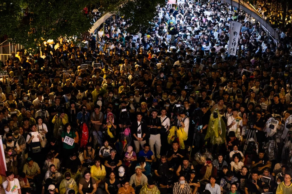 Protesters gather outside Taiwan’s parliament in Taipei (Getty)