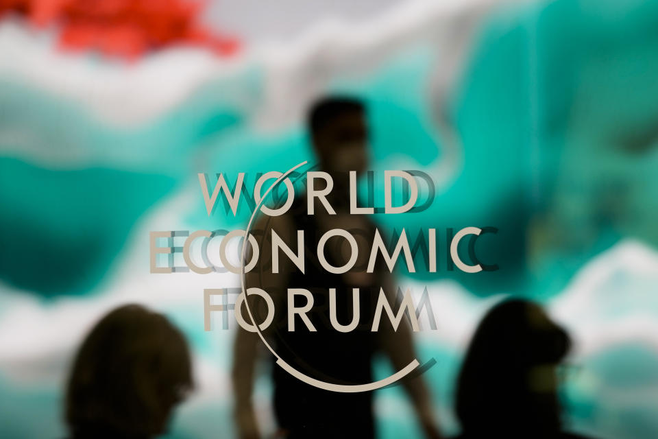 The logo of the World Economic Forum displayed on a window during the Annual Meeting of the Forum in Davos, Switzerland Tuesday, Jan. 17, 2023. The annual meeting of the World Economic Forum is taking place in Davos from Jan. 16 until Jan. 20, 2023. (AP Photo/Markus Schreiber)