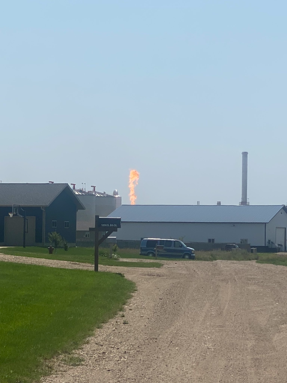 A column of fire shoots out from a Ringneck Energy ethanol plant in Onida, South Dakota on Sunday, July 9, 2023. According to Walt Wendland, CEO of the company, six people were working at the plant when an explosion occurred at around 1:15 p.m., though no injuries were reported as a result.