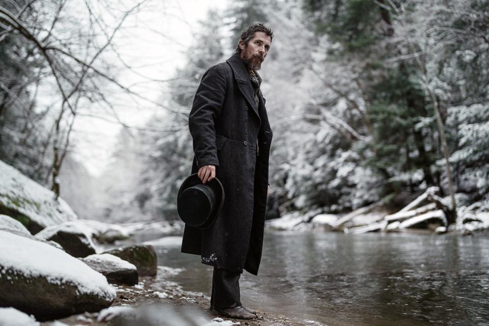 A man stands in the snow