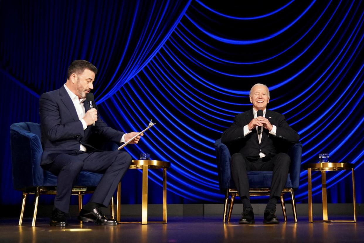 <span>Joe Biden takes part in a conversation Barack Obama and late-night talk-show host Jimmy Kimmel during a fundraiser in Los Angeles on 15 June 2024.</span><span>Photograph: Kevin Lamarque/Reuters</span>