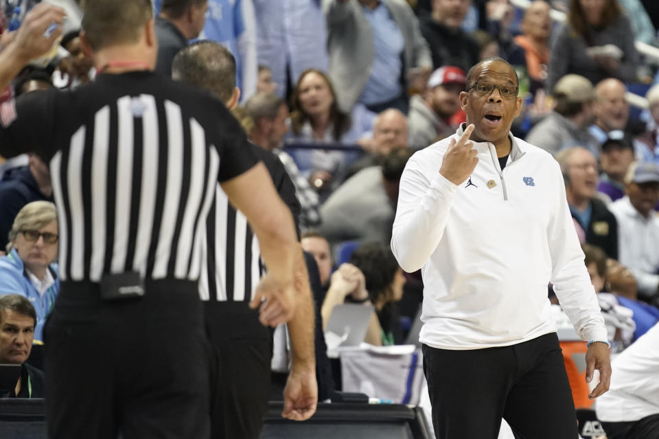 North Carolina head coach Hubert Davis argues a call during the first half of an NCAA college basketball game against Boston College at the Atlantic Coast Conference Tournament in Greensboro, N.C., Wednesday, March 8, 2023. (AP Photo/Chuck Burton)