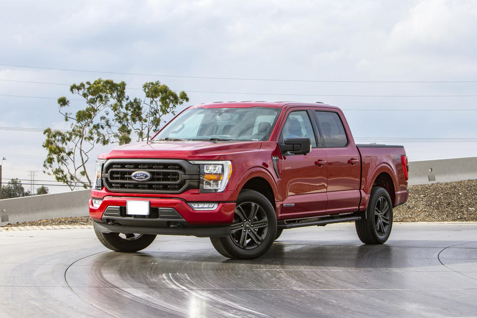 This photo provided by Ford shows the 2022 Ford F-150 with the PowerBoost hybrid engine. It gets an EPA-estimated 23-25 mpg in combined driving. (Courtesy of the Ford Motor Co. via AP)