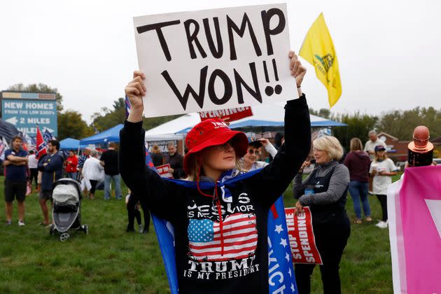 Nancy Galloway, a supporter of former President Donald Trump, protests the visit of President Joe Biden in Howell, Michigan, on Oct. 5. (Photo: JEFF KOWALSKY via Getty Images)