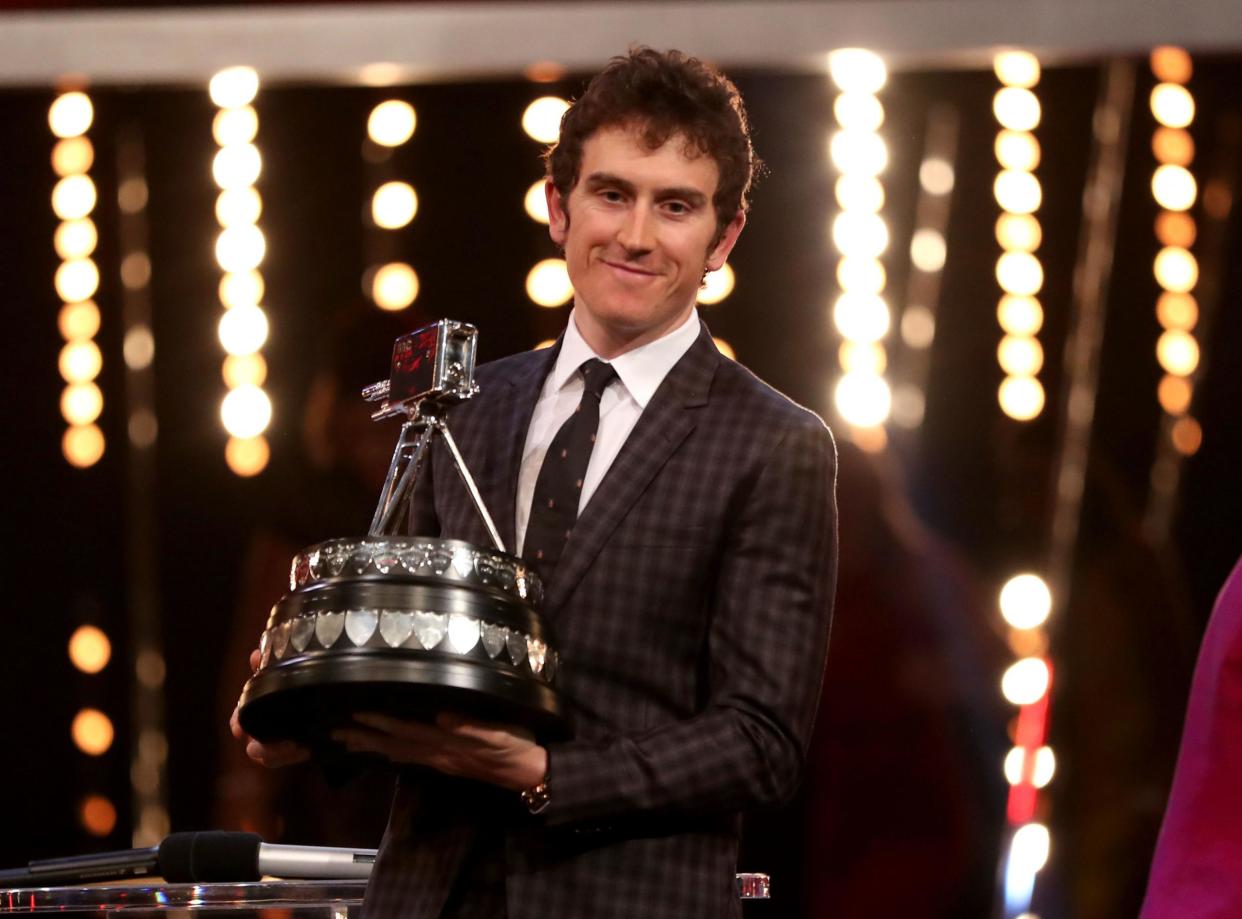 Winner: Geraint Thomas poses with the BBC SPOTY award: PA