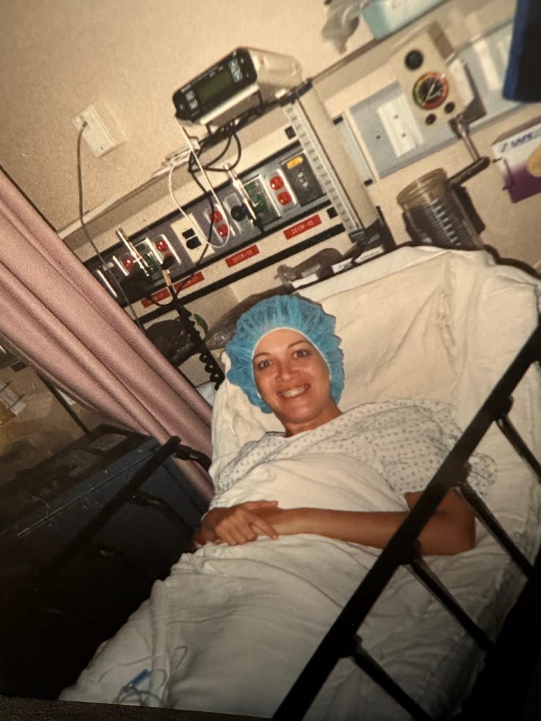 Jenny Feldman is photographed before a TMJ-related surgery during her college years. Feldman says her mother would take her picture before every surgery and encourage her to “smile while you can.” (Janice Ginsburg)