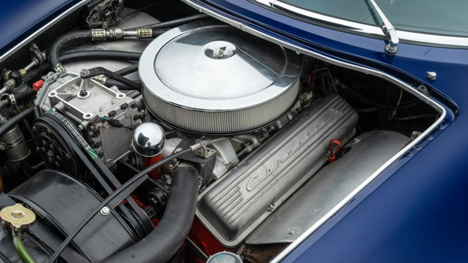 The front-mid-mounted Chevrolet 327 ci V-8 engine inside a 1968 Bizzarrini 5300 GT Strada Alloy.