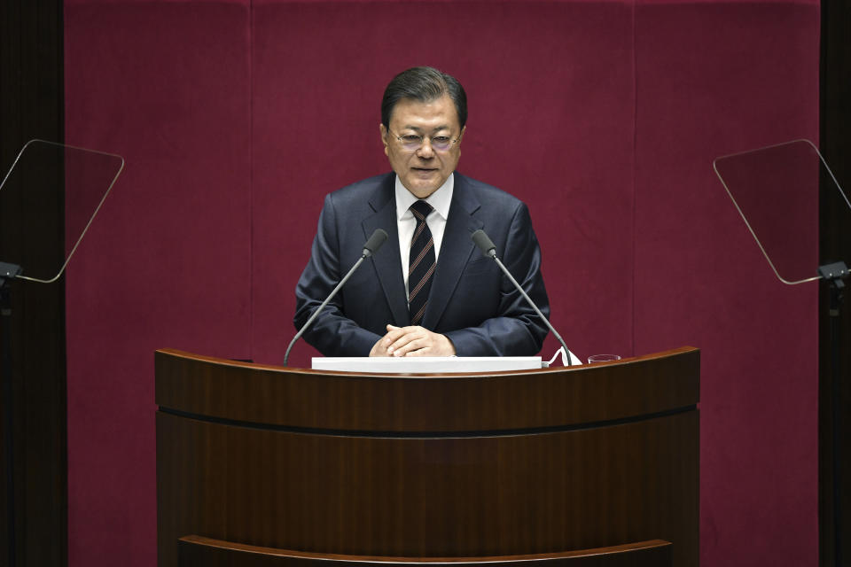 South Korea's President Moon Jae-in delivers a speech at the National Assembly in Seoul Monday, Oct. 25, 2021. Moon said Monday he’ll keep striving to promote peace with North Korea through dialogue until the end of his term next May, after Pyongyang raised animosities with a resumption of provocative weapons tests. (Jung Yeon-je/Pool Photo via AP)