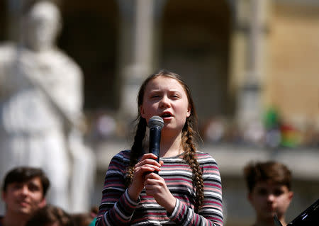 FILE PHOTO: Swedish environmental activist Greta Thunberg joins Italian students to demand action on climate change, in Piazza del Popolo, Rome, Italy April 19, 2019. REUTERS/Yara Nardi/File Photo