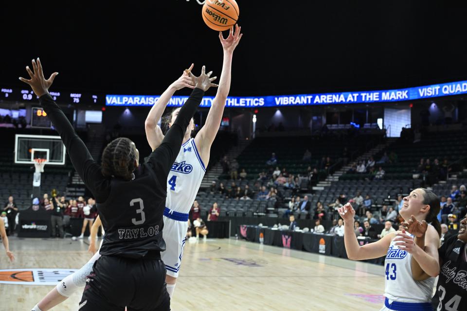 Drake's Anna Miller puts up the game-winning shot at the buzzer to give the Bulldogs the Missouri Valley Tournament championship.