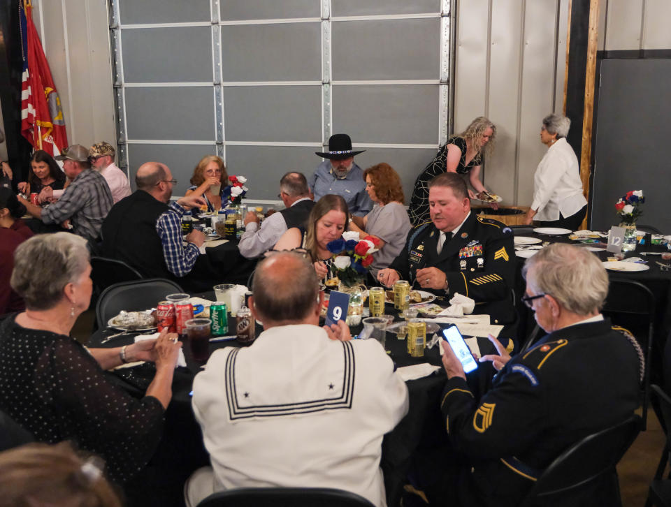 Veterans from multiple services share a table May 18 at the BOOM Adventures Armed Forces Day Banquet in Amarillo.