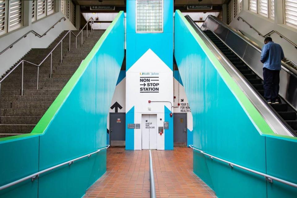 A guest rides the escalator at the UHealth Jackson Metro Station, formerly known as the Civic Center, after the naming ceremony on Friday, July 12, 2024 in Miami, Fla.