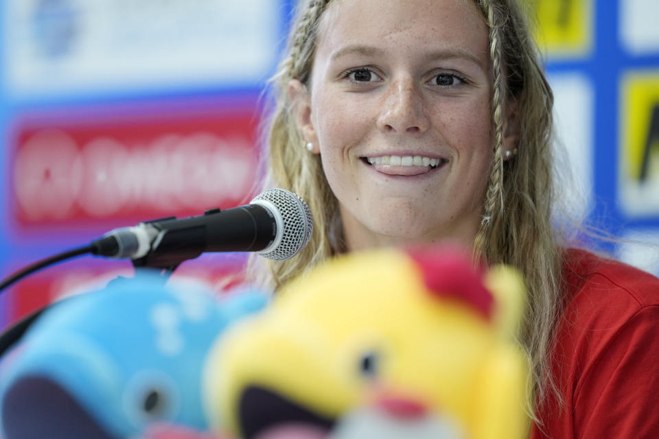 Summer McIntosh of Canada smiles during a press conference at the World Swimming Championships in Fukuoka, Japan,Friday, July 21, 2023. One of the greatest freestylers the sport has ever seen, Katie Ledecky is up against two younger stars: 16-year-old Canadian Summer McIntosh and 22-year-old Australian Ariarne Titmus. (AP Photo/Eugene Hoshiko)