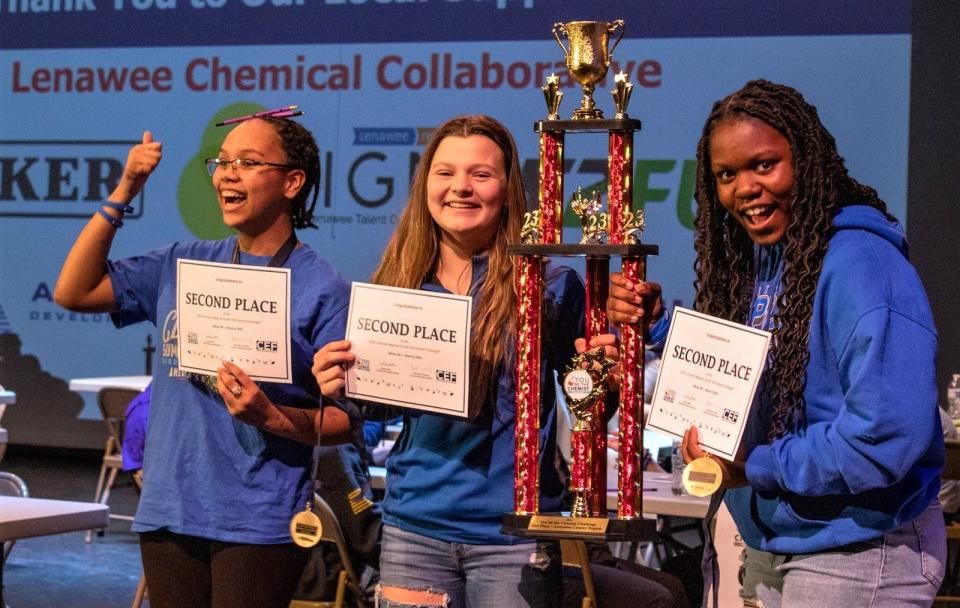 Springbrook Middle School's team of, in no particular order, Makenna Arnold, Eva Garcia and Allison Marks, claimed second place  in the "You Be the Chemist" student-science chemistry challenge and are pictured with their trophy.