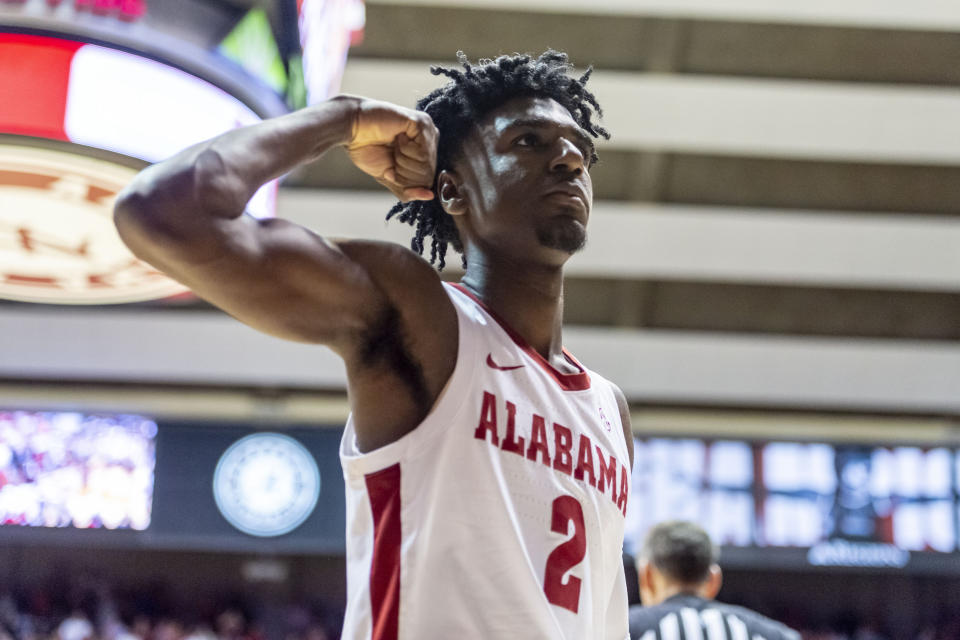 Alabama guard Kira Lewis Jr. (2) flexes after a score against Auburn during the second half of an NCAA college basketball game Wednesday, Jan. 15, 2020, in Tuscaloosa, Ala. (AP Photo/Vasha Hunt)