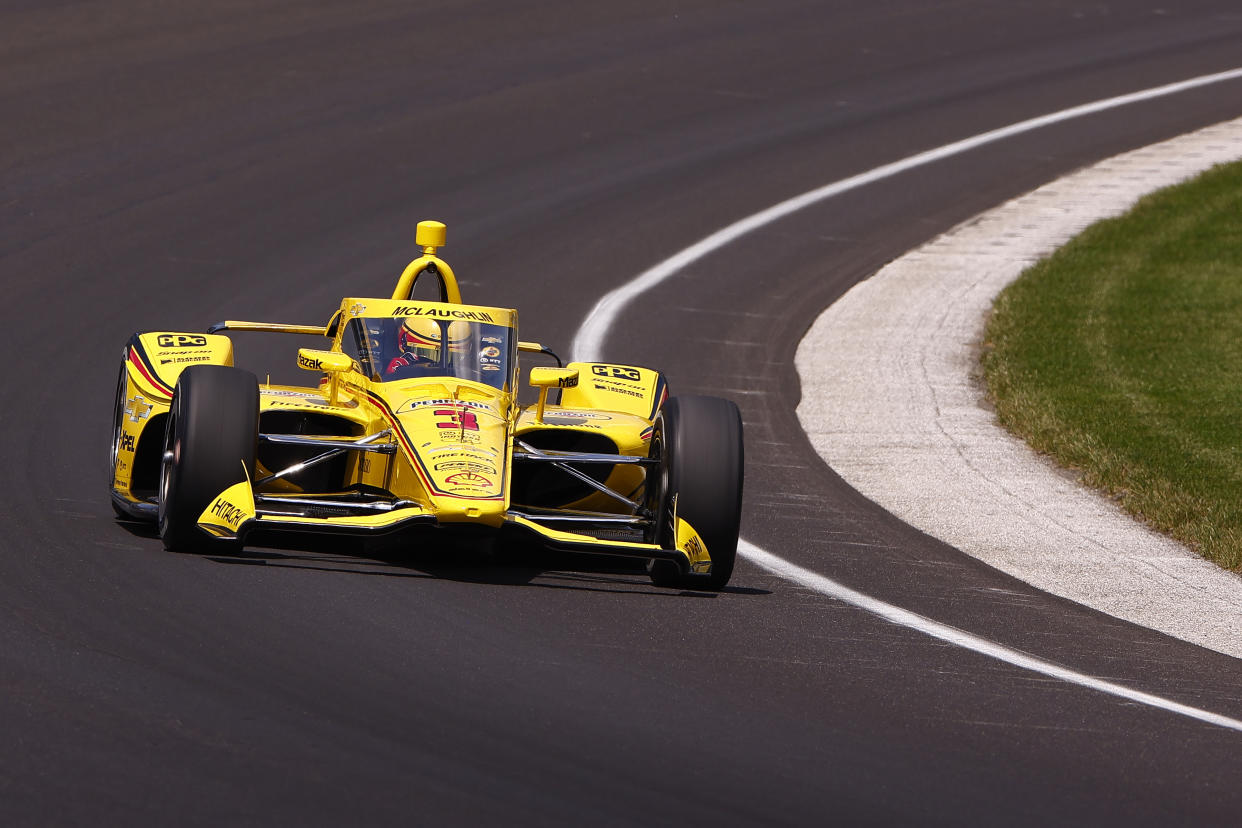 INDIANAPOLIS, IN - MAY 19: Scott Mclaughlin of New Zealand (3) driving for Team Penske exits turn one during the practice session for the fast twelve prior to qualifications for the NTT IndyCar Series Indianapolis 500 Qualifying on May 19 2024 at the Indianapolis Motor Speedway in Indianapolis, IN.  (Photo by Jeffrey Brown/Icon Sportswire via Getty Images)